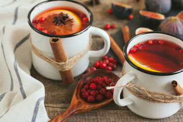 New Year composition with mulled wine on dark wooden background