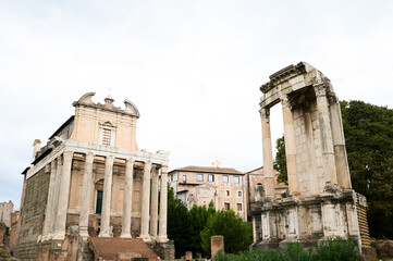 Fototapeta na wymiar Roman Forum or Foro Romano, Rome, Italy. Antique Roman Forum is one of the main tourist attractions of Rome. Scenery of old ruins in Rome center. Italy, Rome.