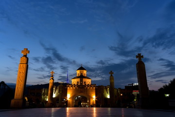 Around view of The Holy Trinity Cathedral of Tbilisi (Sameba) and buildings in old Tbilisi at night