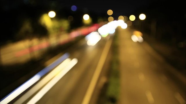Time lapse of defocus long exposure photography on the street at night time