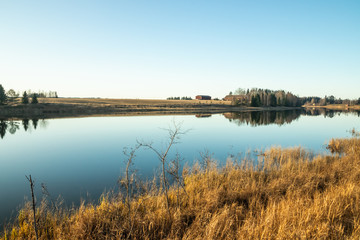 Beautiful autumn landscape of Kymijoki river waters at sunset. Finland, Kymenlaakso, Kouvola