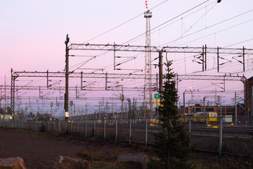Railway yard at beautiful sunset background in Kouvola, Finland.