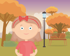 Obraz na płótnie Canvas cute little girl with diadem in the city park, kids toys