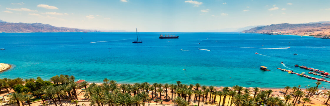  Central public beach in Eilat - Israeli southernmost and famous resort tourist city, located on the northern shores of the Red Sea