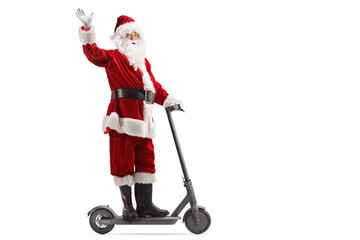 Santa Claus waving from an electric scooter