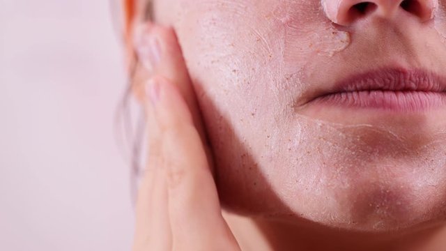 Woman Gently Washing Face With Scrub, Skincare Routine in Slow Motion