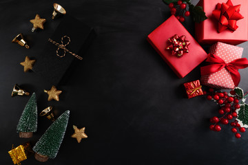 Merry Christmas, xmas present gift and decoration on black background