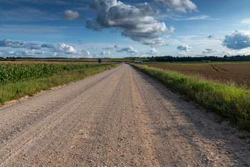 Gravel road in countryside of Latvia.