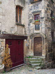 Fototapeta na wymiar Puy en Velay Street with old doors and windows