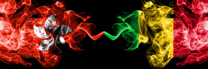 Hong Kong, China vs Mali smoky mystic states flags placed side by side. Concept and idea thick colored silky abstract smoke flags