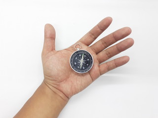 Plakat Useful Metallic Dark Needle Magnetic Hand Compass to Show Direction when Camping or Travelling Concept in White Isolated Background