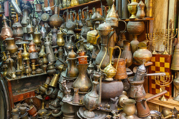 Fototapeta na wymiar Vintage metallic and copper stuff sold on a market in Jerusalem old city, Israel