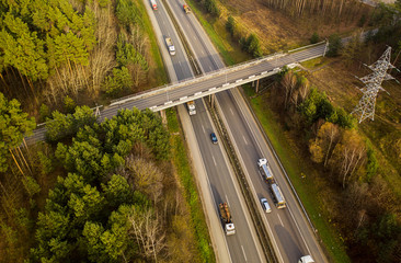 Aerial: highway with cars in autumn