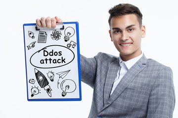 Business, technology, internet and network concept. Young businessman shows a keyword: Ddos attack