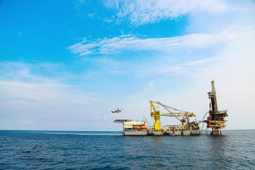 Offshore construction platform for production oil and gas. Oil and gas industry and hard work. Production platform and operation process by manual and auto function from control room.