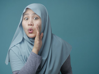 Muslim Lady Whispering Something