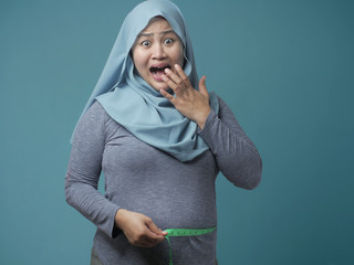 Funny Fat Asian Muslim Woman Measuring Waist
