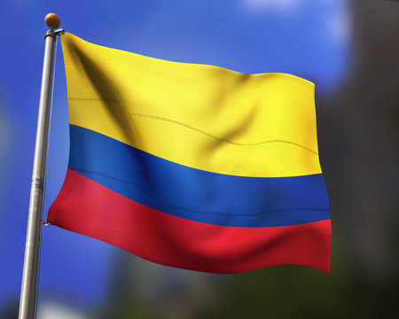 Colombian flag waving in blue sky