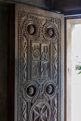 Ornate front door of the Church of Vlacherna Mother of God in Zugdidi is located in the Dadiani Palace - the residence of an ancient family of Megrelian princes in Georgia