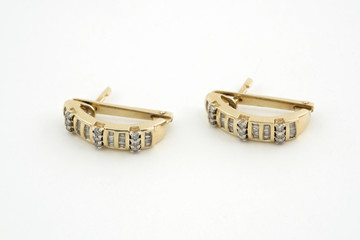 pair of yellow gold earrings