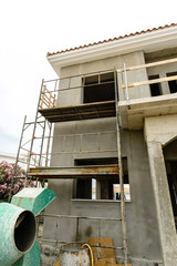Fototapeta na wymiar Construction of new homes. Cottages. Sale of private villas.