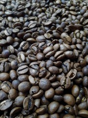  close-up of freshly roasted brown aromatic coffee beans