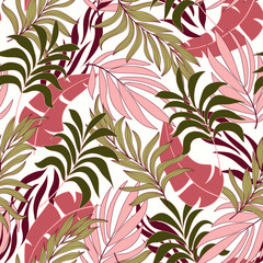 Original seamless tropical pattern with bright pink and green plants and leaves on a delicate background. Printing and textiles.  Seamless exotic pattern with tropical plants.