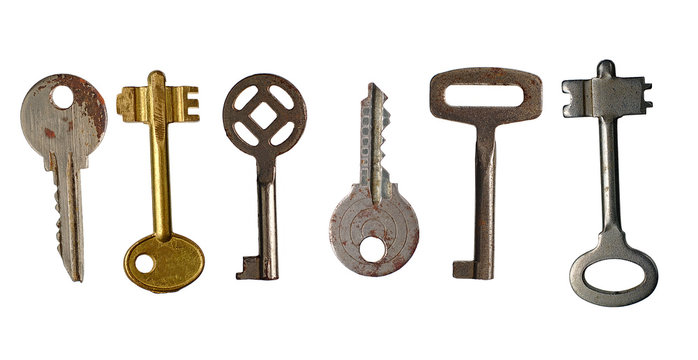 Old keys isolated on white background