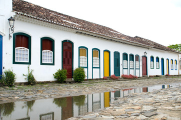 Charming colonial houses along the cobblestone streets of the historic center of Paraty (Parati), Rio de Janeiro, Brazil, showcasing the town's well-preserved architecture and rich history