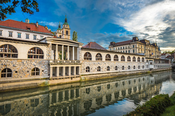 Fototapeta na wymiar Ljubljanica River and Central Market, Ljubljana, Slovenia