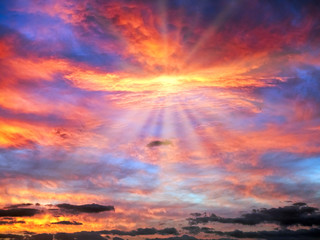 Cloudy Sunrise Sky in Blue, Red, Orange, Yellow with Sun Rays