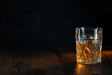 Whiskey in glass with ice