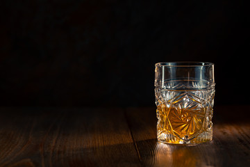 Whiskey in glass with ice