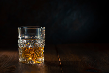 Whiskey in glass with ice