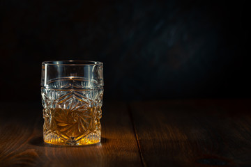 Whiskey in glass with ice