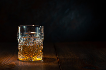 Whiskey in glass with ice