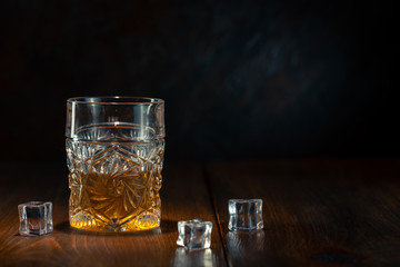 Whiskey in glass with ice