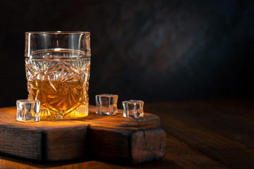 Whiskey in glass with ice