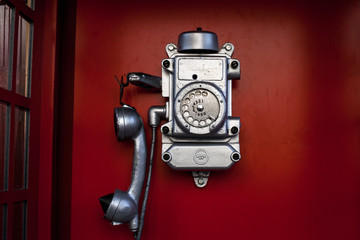 Street phone box. Old dirty and scratched telephone booth