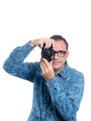 man taking photos with an old camera