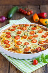 Quiche with tomatoes, spinach and feta cheese