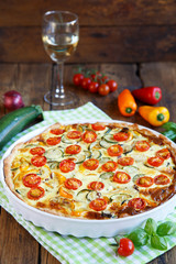 Quiche with tomatoes, spinach and feta cheese