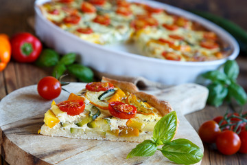 Quiche with tomatoes, spinach and feta cheese
