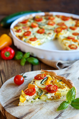 Quiche with tomatoes, spinach and feta cheese