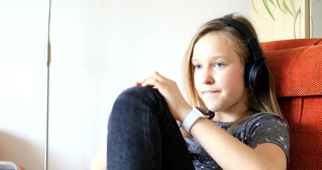 Girl uses modern technology. Viewing content on smart watch. Stabilized video.