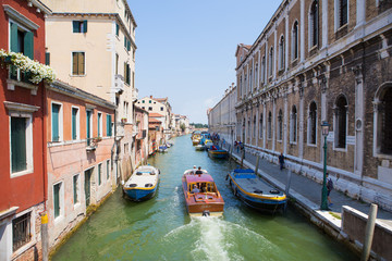 Fototapeta na wymiar Beautiful sunny views of the canals of Venice, Italy