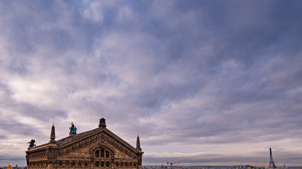 Paris sky with Eiffel Tower and Palais Garnier