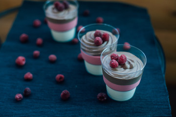 Sweet chocolate tiramisu at the black table