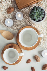 Obraz na płótnie Canvas Composition with white coffee tea white cups
