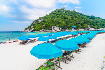 Outdoors scenic landscape vacation  beach with beach chair and sun umbrella for traveler Koh Nang Yuan, Landmark tourist travel Samui Thailand summer holiday, Tourism beautiful destination place Asia